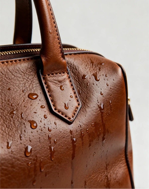 Water droplets on a microfiber leather bag Water droplets on a microfiber leather bag